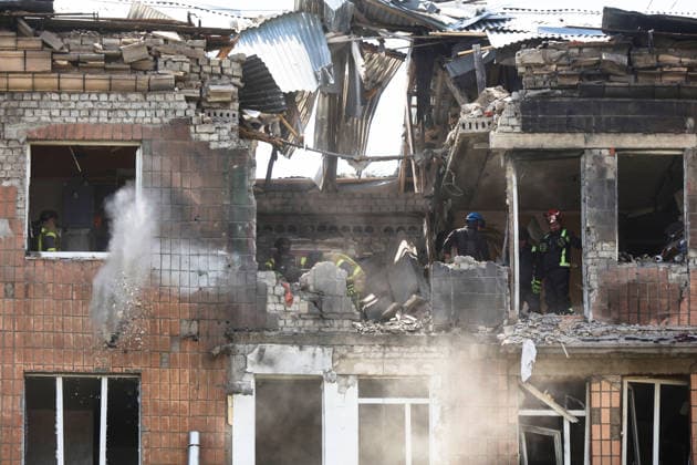 RECORD DATE NOT STATED Rescue workers respond at the scene of a Russian missile strike on a five-storey residential building in Kharkiv, Ukraine, on July 8, 2026. The Russian army launched a missile attack on a five-storey residential building in the city’s Nemyshlianskyi district, partially destroying the fifth floor. Two people were killed and at least 23 residents, including four children, were injured (Photo by Viacheslav Madiievskyi Ukrinform) Russia strikes five-storey residential building in Kharkiv with missile  Copyright: xViacheslavxMadiievskyix