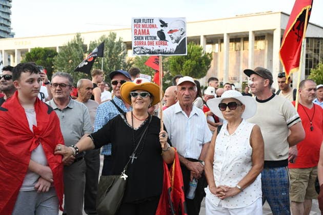 Protests continue in Albania against the planned tourism project in Zvernec TIRANA, ALBANIA - JULY 8: Demonstrators holding Albanian flag and posters gather at Skanderbeg Square during the 39th consecutive day of protests held under the slogan Albania is Not for Sale, opposing a planned tourism project in the Zvernec area of Vlore, in Tirana, Albania, on July 8, 2026. Olsi Shehu Anadolu Tirana Albania. Editorial use only. Please get in touch for any other usage.  Copyright: x2026xAnadoluxOlsixShehux
