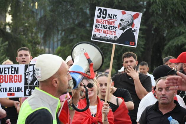 Protests continue in Albania against the planned tourism project in Zvernec TIRANA, ALBANIA - JULY 8: Demonstrators holding Albanian flag and posters gather at Skanderbeg Square during the 39th consecutive day of protests held under the slogan Albania is Not for Sale, opposing a planned tourism project in the Zvernec area of Vlore, in Tirana, Albania, on July 8, 2026. Olsi Shehu Anadolu Tirana Albania. Editorial use only. Please get in touch for any other usage.  Copyright: x2026xAnadoluxOlsixShehux