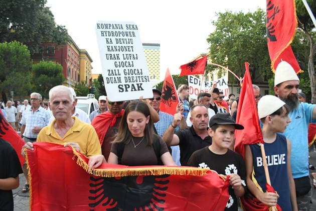 Protests continue in Albania against the planned tourism project in Zvernec TIRANA, ALBANIA - JULY 8: Demonstrators holding Albanian flag and posters gather at Skanderbeg Square during the 39th consecutive day of protests held under the slogan Albania is Not for Sale, opposing a planned tourism project in the Zvernec area of Vlore, in Tirana, Albania, on July 8, 2026. Olsi Shehu Anadolu Tirana Albania. Editorial use only. Please get in touch for any other usage.  Copyright: x2026xAnadoluxOlsixShehux