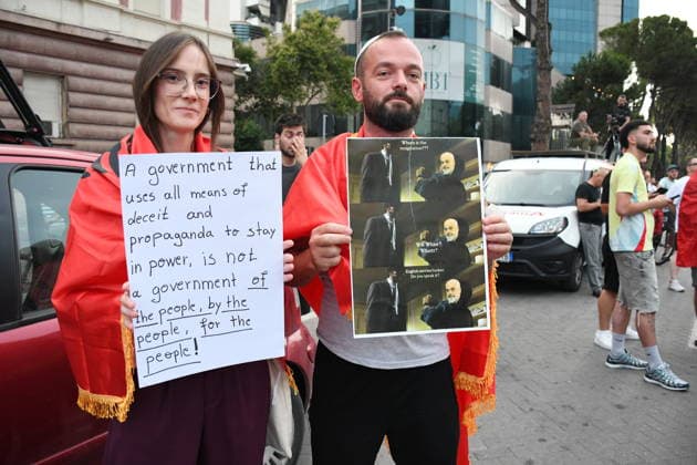 Protests continue in Albania against the planned tourism project in Zvernec TIRANA, ALBANIA - JULY 8: Demonstrators holding Albanian flag and posters gather at Skanderbeg Square during the 39th consecutive day of protests held under the slogan Albania is Not for Sale, opposing a planned tourism project in the Zvernec area of Vlore, in Tirana, Albania, on July 8, 2026. Olsi Shehu Anadolu Tirana Albania. Editorial use only. Please get in touch for any other usage.  Copyright: x2026xAnadoluxOlsixShehux