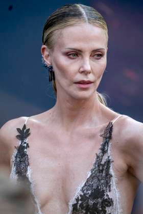 July 8, 2026, Paris, Fra, France: Charlize Theron arrive at the Odyssey premiere in Paris Paris France - ZUMAv140 20260708_zip_v140_011 Copyright: xReginaxVoroninax