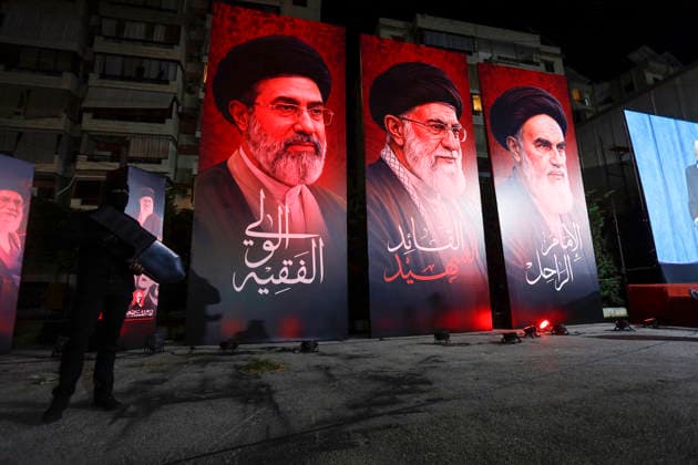 July 8, 2026, Beirut, Beirut, lebanon: Supporters of Hezbollah attend a symbolic funeral ceremony for IranÃ¢â‚¬â ¢s Supreme Leader Ali Khamenei in the southern suburbs of Beirut, Lebanon, organized by Hezbollah and held simultaneously with similar gatherings in Baalbek, Tyre and Ghaziyeh. Thousands of participants gathered at Ashura Square carrying flags, slogans and images of Iranian and Hezbollah leaders. Hezbollah Secretary-General Naim Qassem delivered a speech addressing regional developments, IranÃ¢â‚¬â ¢s role, and LebanonÃ¢â‚¬â ¢s political situation. Beirut lebanon - ZUMAb339 20260708_znp_b339_004 Copyright: xAbdulxKaderxAlxBayx