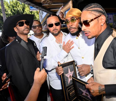 Krayzie Bone, Bizzy Bone, Flesh-n-Bone and Layzie Bone (L-R) of the Hip-Hop group Bone Thugs-N-Harmony speak with reporters during a ceremony honoring them with the 2,851st star on the Hollywood Walk of Fame in Los Angeles on Wednesday, July 8, 2026.  LAP2026070805 JIMxRUYMEN