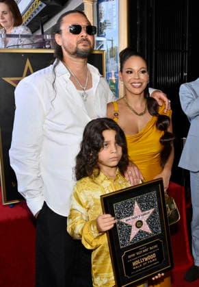 Bizzy Bone (L) of the Hip-Hop group Bone Thugs-N-Harmony is joined by his wife Jessica Cassidy and their son Jessy Anderson during a ceremony honoring them with the 2,851st star on the Hollywood Walk of Fame in Los Angeles on Wednesday, July 8, 2026.  LAP2026070828 JIMxRUYMEN