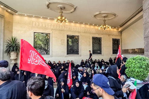 IRAN, MASHHAD - JULY 9, 2026: People gather outside a mausoleum ahead of the burial of Iranian Supreme Leader Ayatollah Ali Khamenei. Khamenei was killed in a joint US-Israeli airstrike on February 28. Mark Kiselev TASS  94850588