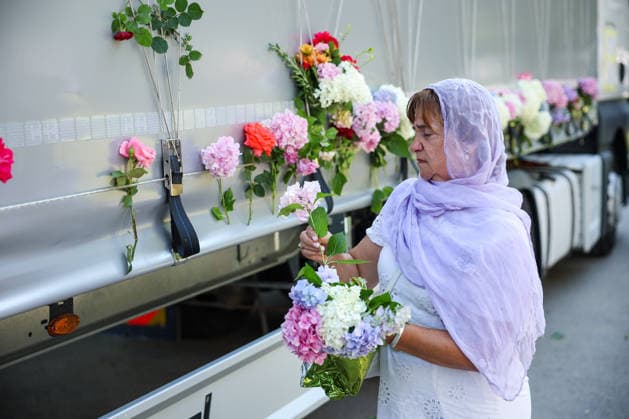 Ten newly identified victims of Srebrenica massacre will be buried on massacre anniversary A woman places a flower on a truck carrying remains of the identified victims of the 1995 Srebrenica massacre to the Memorial centre in Potocari, where they will be buried on July 11, in Visoko, Bosnia and Herzegovina, July 09, 2026.  ArminxDurgut PIXSELL