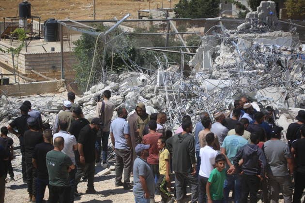 Israeli forces demolish home in southern West Bank town of Yatta Israeli forces demolish the two-story home of Palestinian resident Iyad Musleh al-Amour in the Khallet al-Miyeh area, east of the town of Yatta, south of Hebron in the occupied West Bank, on July 9, 2026. The house was home to three families comprising 15 people. According to local residents, the demolition was carried out on the grounds that the building lacked a permit, leaving the families displaced. Photo by Mamoun Wazwaz apaimages Hebron West Bank Palestinian Territory 090726_Hebron_MW_00(51) Copyright: xapaimagesxMamounxWazwazx xapaimagesx