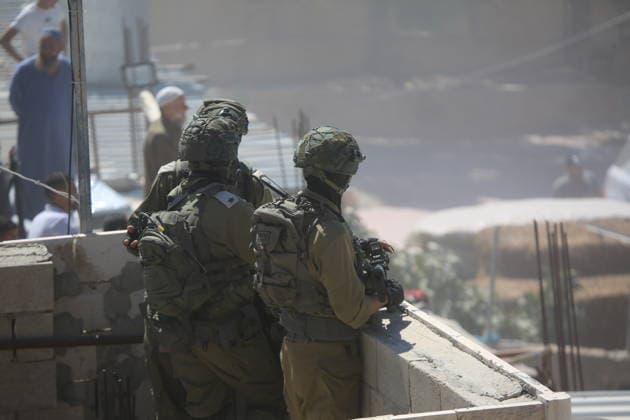 Israeli forces demolish home in southern West Bank town of Yatta Israeli forces demolish the two-story home of Palestinian resident Iyad Musleh al-Amour in the Khallet al-Miyeh area, east of the town of Yatta, south of Hebron in the occupied West Bank, on July 9, 2026. The house was home to three families comprising 15 people. According to local residents, the demolition was carried out on the grounds that the building lacked a permit, leaving the families displaced. Photo by Mamoun Wazwaz apaimages Hebron West Bank Palestinian Territory 090726_Hebron_MW_00(36) Copyright: xapaimagesxMamounxWazwazx xapaimagesx