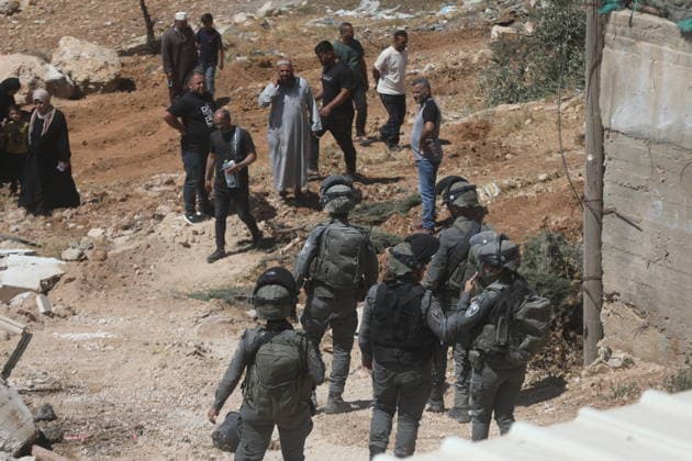 Israeli forces demolish home in southern West Bank town of Yatta Israeli forces demolish the two-story home of Palestinian resident Iyad Musleh al-Amour in the Khallet al-Miyeh area, east of the town of Yatta, south of Hebron in the occupied West Bank, on July 9, 2026. The house was home to three families comprising 15 people. According to local residents, the demolition was carried out on the grounds that the building lacked a permit, leaving the families displaced. Photo by Mamoun Wazwaz apaimages Hebron West Bank Palestinian Territory 090726_Hebron_MW_00(17) Copyright: xapaimagesxMamounxWazwazx xapaimagesx