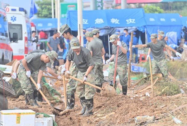 (260709) -- NANNING, July 9, 2026 -- Rescuers clean up silt and debris from a street after floodwater recedes in Yunbiao Town, Hengzhou City, south China s Guangxi Zhuang Autonomous Region, July 9, 2026. Recent extreme rainstorms triggered by Typhoon Maysak, the 10th typhoon of the year, have caused severe flooding in parts of Guangxi in the Pearl River basin. Guangxi is continuing its search and rescue operations for missing persons, enhancing resettlement services for affected residents and advancing post-disaster reconstruction. ) FOCUS Guangxi makes all-out rescue, relief efforts after rain-triggered disasters HuangxXiaobang 
