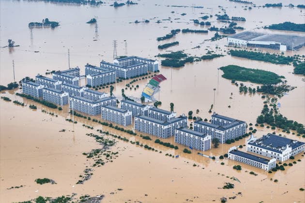(260709) -- NANNING, July 9, 2026 -- An aerial drone photo taken on July 8, 2026 shows the flooded Guangxi Logistics Vocational and Technical College in Guigang City, south China s Guangxi Zhuang Autonomous Region. Recent extreme rainstorms triggered by Typhoon Maysak, the 10th typhoon of the year, have caused severe flooding in parts of Guangxi in the Pearl River basin. Guangxi is continuing its search and rescue operations for missing persons, enhancing resettlement services for affected residents and advancing post-disaster reconstruction. ) FOCUS Guangxi makes all-out rescue, relief efforts after rain-triggered disasters ZhouxHua 