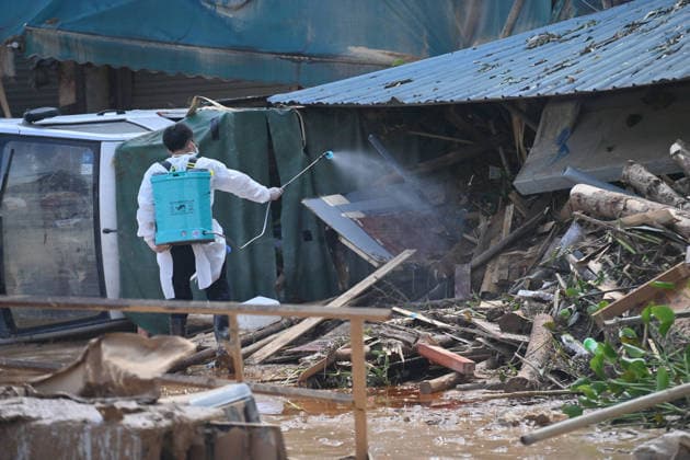 (260709) -- NANNING, July 9, 2026 -- A staff member disinfects a street in Yunbiao Town, Hengzhou City, south China s Guangxi Zhuang Autonomous Region, July 9, 2026. Recent extreme rainstorms triggered by Typhoon Maysak, the 10th typhoon of the year, have caused severe flooding in parts of Guangxi in the Pearl River basin. Guangxi is continuing its search and rescue operations for missing persons, enhancing resettlement services for affected residents and advancing post-disaster reconstruction. ) FOCUS Guangxi makes all-out rescue, relief efforts after rain-triggered disasters HuangxXiaobang 