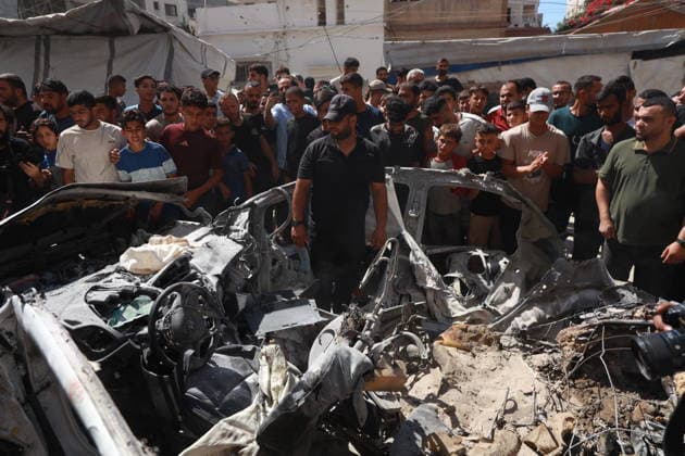 Palestinians gather at site of Israeli strike in western Gaza City Palestinians gather at the site of an Israeli strike that targeted a vehicle west of Gaza City, Gaza Strip, on July 9, 2026. According to local sources, the strike killed one person and wounded others. Photo by Hadi Daoud apaimages Gaza city Gaza Strip Palestinian Territory 090726_Gaza_HD_01(20) Copyright: xapaimagesxHadixDaoudx xapaimagesx