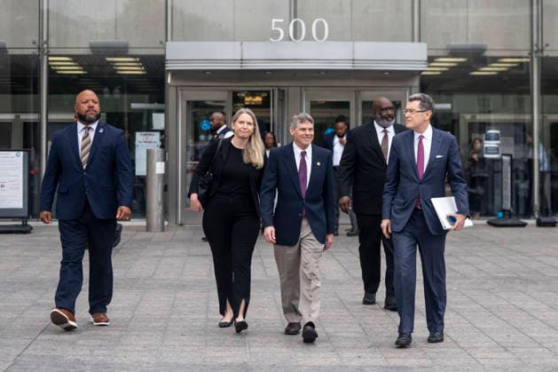 Olympic canoeist David Hearn departs the Moultrie Courthouse with his lawyers, Norm Eisen and Mary Dohrmann, after pleading not guilty to damaging the Lincoln Memorial Reflecting Pool in Washington, DC on Thursday, June 9, 2026. Hearn was indicted on July 2 on one count of destruction of property of more than $1,000 for allegedly damaging the Reflecting Pool, carrying a maximum pentyl of 10 years in prison if convicted.  WAP20260709308 BONNIExCASH
