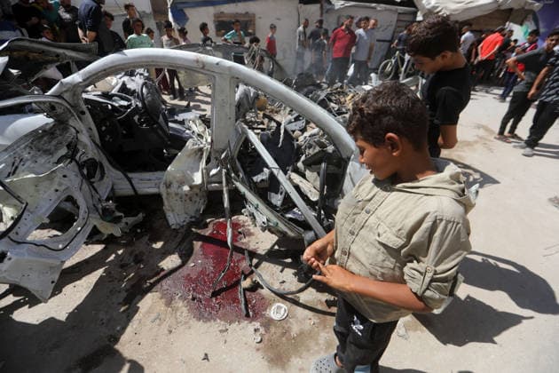 Palestinians gather at site of Israeli strike in western Gaza City Palestinians gather at the site of an Israeli strike that targeted a vehicle west of Gaza City, Gaza Strip, on July 9, 2026. According to local sources, the strike killed one person and wounded others. Photo by Bilal Osama apaimages Gaza city Gaza Strip Palestinian Territory 090726_Gaza_BO_02(5) Copyright: xapaimagesxBilalxOsamax xapaimagesx