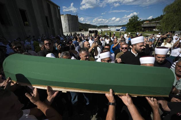 Column with the coffins of ten victims of the Srebrenica genocide has arrived in Potocari POTOCARI, BOSNIA AND HERZEGOVINA - JULY 09: People carry coffins containing the remains of victims of the 1995 Srebrenica genocide upon their arrival at the Memorial Center as family members and friends gather at the former Battery Factory to pay their respects to those who will be laid to rest during a collective funeral on July 11 in Potocari, Bosnia and Herzegovina, on July 09, 2026. Samir Jordamovic Anadolu Potocari Bosnia and Herzegovina. Editorial use only. Please get in touch for any other usage.  Copyright: x2026xAnadoluxSamirxJordamovicx