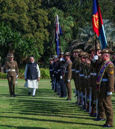 RECORD DATE NOT STATED PM Modi receives a grand ceremonial welcome, in Melbourne Melbourne Australia , Jul 09 (ANI): Prime Minister Narendra Modi receives a grand ceremonial welcome on his arrival at the official residence of Victoria Governor Margaret Gardner AC, in Melbourne on Thursday. (Narendra Modi Photo Gallery ANI Photo) Melbourne Australia Copyright: xANIx ANI_20260709040
