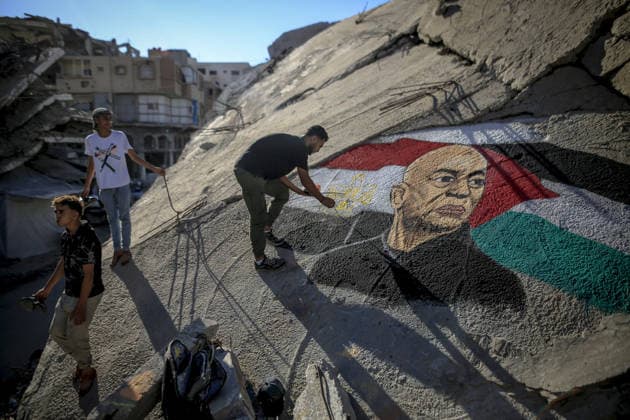 Artist paints Hossam Hassan portrait on Gaza rubble GAZA CITY, GAZA, PALESTINE - JULY 09: Palestinian artist Obai Al-Karshali paints a portrait of Egyptian National Football Team head coach Hossam Hassan on the rubble of a building destroyed by Israeli attacks to show his appreciation for the support given to the Palestinian people in the Al-Nasr neighborhood of Gaza City, Gaza, Palestine on July 09, 2026. Saeed M. M. T. Jaras Anadolu Gaza City Gaza. Editorial use only. Please get in touch for any other usage.  Copyright: x2026xAnadoluxSaeedxM.xM.xT.xJarasx