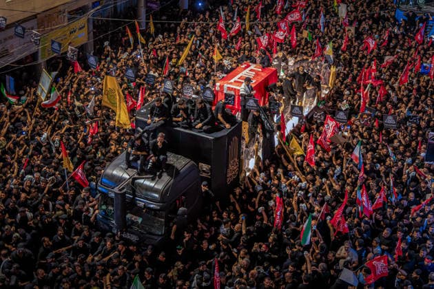 July 9, 2026, Karbala, Iraq: Mourners surround the convoy carrying the coffins of Iran s slain supreme leader Ali Khamenei as they take part in the funeral procession at the Imam Hussein Shrine in Karbala early on July 9, 2026. Iranians were preparing on July 9 to bury their slain leader Ali Khamenei in his hometown of Mashhad in northeast Iran, as new US strikes threatened to trigger a fresh escalation in the Middle East war. The late leader s burial follows a multi-day funeral ceremony that attracted millions of mourners across various cities in both Iran and Iraq. Karbala Iraq - ZUMAi98_ 20260709_zih_i98_054 Copyright: xIranianxSupremexLeader SxOfficex