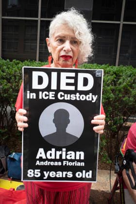 July 9, 2026, New York, New York, USA: A protester holds a sign that reads DIED in ICE Custody Adrian Andreas Florian 85 years old at Rise and Resist s weekly vigil for those impacted by President Trump s immigrant detention and mass deportation policies, held outside the immigration courts, Department of Homeland Security and ICE offices at 26 Federal Plaza in Lower Manhattan. The demonstration takes place days after the death of L. Salgado Araujo who was shot and killed by U.S. Immigration and Customs Enforcement (ICE) in Houston during a targeted enforcement operation. New York USA  - ZUMAr174 20260709_znp_r174_005 Copyright: xGinaxMxRandazzox