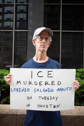 July 9, 2026, New York, New York, USA: A protester holds a sign that reads ICE MURDERED LORENZO SALGADO ARAUJO ON TUESDAY IN HOUSTON at Rise and Resist s weekly vigil for those impacted by President Trump s immigrant detention and mass deportation policies, held outside the immigration courts, Department of Homeland Security and ICE offices at 26 Federal Plaza in Lower Manhattan. The demonstration takes place days after the death of L. Salgado Araujo who was shot and killed by U.S. Immigration and Customs Enforcement (ICE) in Houston during a targeted enforcement operation. New York USA  - ZUMAr174 20260709_znp_r174_013 Copyright: xGinaxMxRandazzox
