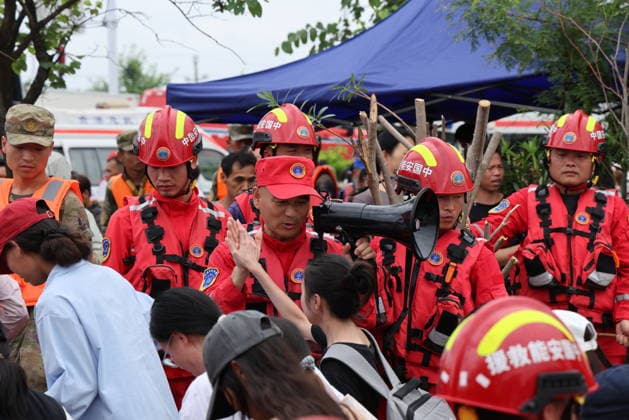 GUIGANG, CHINA - JULY 09: Rescuers evacuate trapped students on July 9, 2026 in Guigang, Guangxi Zhuang Autonomous Region of China. Recent extreme rainstorms triggered by Typhoon Maysak, the 10th typhoon of the year, have caused severe flooding in parts of Guangxi in the Pearl River basin. Guangxi is continuing its search and rescue operations for missing persons, enhancing resettlement services for affected residents and advancing post-disaster reconstruction.  Copyright: xVCGx 111653352922