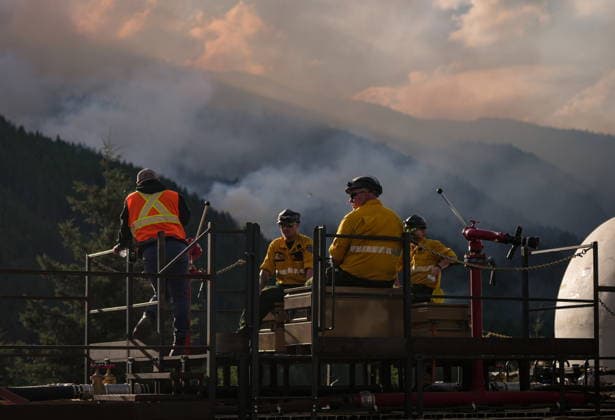 July 9, 2026, Boston Bar, Bc, CANADA: CN Rail workers on a firefighting train travel past the Brunswick Creek wildfire in Boston Bar, B.C., on Thursday, July 9, 2026. Boston Bar CANADA  - ZUMAc35_ 20260709_zaf_c35_074 Copyright: xDarrylxDyckx