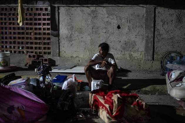 Earthquake survivors continue living in temporary shelters in La Guaira LA GUAIRA, VENEZUELA - JULY 10: A resident sits outside while staying outdoors in La Guaira, Venezuela, on July 10, 2026. Residents continue to spend their nights outside after the powerful 7.2 and 7.5 magnitude earthquakes that struck Venezuela in succession on June 24 caused widespread destruction in the coastal city, forcing thousands of people to leave their homes. Cem Tekkesinoglu Anadolu La Guaira Venezuela. Editorial use only. Please get in touch for any other usage.  Copyright: x2026xAnadoluxCemxTekkesinoglux