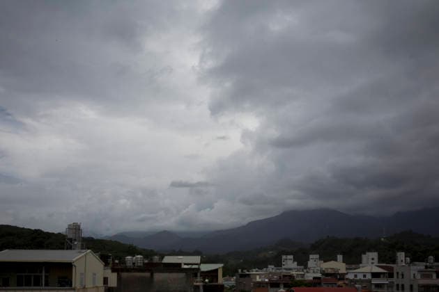 July 10, 2026, Taichung, Taiwan: Dark clouds over mountain and buildings on the outskirts of Taichung, Taiwan. The Central Weather Administration (CWA) has issued a land warning for Typhoon Bavi. Rainfall is expected to increase in mountainous areas of northern, central and southern Taiwan later in the day, with the heaviest precipitation forecast from Friday night through Saturday. Taichung Taiwan  - ZUMAc217 20260710_zip_c217_001 Copyright: xAndrexM.xChangx