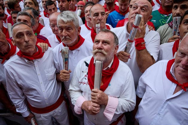 San Fermin Festival in Spain PAMPLONA, SPAIN - JULY 10: Participants gather to take part in traditional rituals ahead of the fourth encierro, or bull run, of the world-renowned San Fermin Festival in Pamplona, Spain on July 10, 2026. Dressed in the festival’s traditional white clothing and red scarves, participants seek the protection of San Fermin before running along the 875-meter route through the city center. Ruben Albarran Anadolu Pamplona Spain. Editorial use only. Please get in touch for any other usage.  Copyright: x2026xAnadoluxRubenxAlbarranx