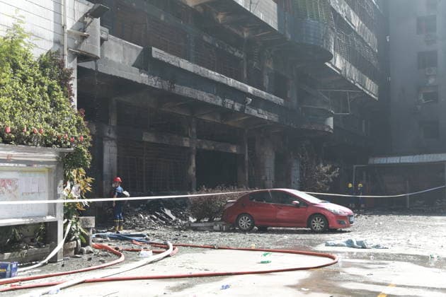 (260710) -- JINJIANG, July 10, 2026 -- This photo taken on July 10, 2026 shows the site of a fire that broke out at a shoe factory in Jiangtou Village, Chendai Township of Jinjiang City, southeast China s Fujian Province. Search efforts largely concluded on Friday following a fatal fire that killed 28 people a day earlier at a shoe factory in the city of Jinjiang, local authorities said. ) (SpotNews)CHINA-FUJIAN-JINJIANG-SHOE FACTORY-FIRE-AFTERMATH (CN) ChenxWang 