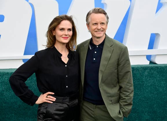 Cast member David Hornsby (R) and his wife, actress Emily Deschanel attend the premiere of the Netflix sport comedy TV series The Hawk at the Directors Village in the Westwood section of Los Angeles on Thursday, July 9, 2026. Storyline Follows Lonnie Hawkins, 2004 s top golfer, as he struggles to recapture his magic late in his career, refusing to believe he s anything other than one stroke away from golf s greatest comeback.  LAP2026070941 JIMxRUYMEN