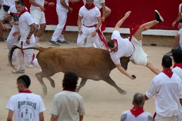 July 10, 2026, Pamplona, Spain: PAMPLONA, SPAIN Ã¢â‚¬ JULY 10, 2026: Participants wait by the bullpens gate for the release of a heifer during the vaquillas event following the fourth running of the bulls of the San FermoÂ­n festival in Pamplona, northern Spain, on July 10, 2026. JNA Press Pamplona Spain  - ZUMAq101 20260710_zna_q101_041 Copyright: xUnaixBeroizx