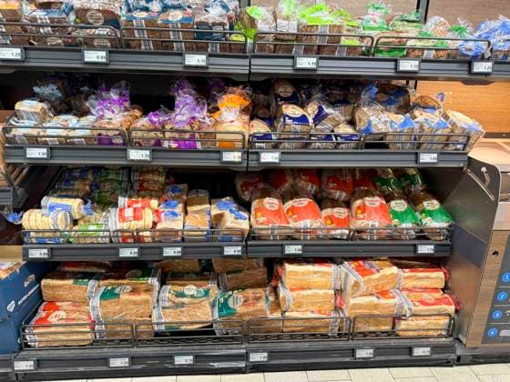SYMB BROT Bread, small loaves, Schwarzbot, toast—various varieties, sliced and packaged in plastic, on the shelf for sale at the discount store Aldi in Hamburg, Germany