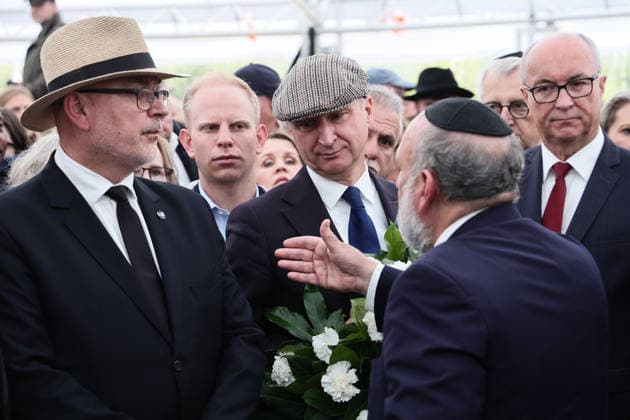 85th anniversary of the Jedwabne massacre Photo: Anita Walczewska East News, The 85th anniversary of the Jedwabne massacre , at 10 July 2026 in northeastern Poland. A tragedy took place on 1941 during the German occupation of Poland. In contrast to the official commemorations, Grzegorz Braun?s Confederation of the Polish Crown - a far-right politician who questions the role of Poles in the murder of hundreds of Jews - is organizing its own event. Pictured: Secretary of State in the Office of the President of the Republic of Poland Wojciech Kolarski (3L), Chief Rabbi of Poland Michael Schudrich (from behind) and Speaker of the Sejm Wlodzimierz Czarzasty (R) during a ceremony at the Memorial to the Murdered Jews of Jedwabne. EN_01680706_0 