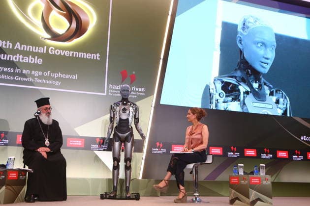July 10, 2026, Athens, Greece: AMECA robot speaks with one philosopher and one preast at 30th Annual Government Roundtable Economist conference. Ameca is the worldÃ¢â‚¬â ¢s leading social humanoid robot, created by UK robotics company Engineered Arts. First unveiled in 2021, Ameca was designed for advanced, natural and engaging human-robot interaction, combining artificial intelligence, expressive and realistic facial movements, and lifelike gestures. Athens Greece  - ZUMAv62_ 20260710_zaf_v62_008 Copyright: xAristidisxVafeiadakisx