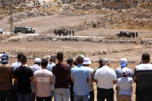 Israeli settlers prevented Palestinian farmers from accessing their agricultural lands in Hebron HEBRON, WEST BANK, PALESTINE - JULY 10: Palestinians perform Friday prayers on land threatened with confiscation by Israel while Israeli settlers, protected by Israeli forces, continue to block roads leading to Palestinian farmers lands in the town of Izna, near Hebron, West Bank, Palestine on July 10, 2026. Wisam Hashlamoun Anadolu Hebron West Bank. Editorial use only. Please get in touch for any other usage.  Copyright: x2026xAnadoluxWisamxHashlamounx