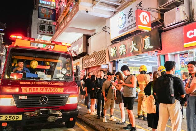 HONG KONG-DAILY MONGKOK-BUILDING-FIRE Fire engines are seen parked outside Sun Hing Building on Nathan Road following a report of a fire in Mong Kok on July 10, 2026 in Hong Kong. The incident, reported at around 10 p.m., was upgraded to a No. 2 alarm fire, prompting the deployment of multiple fire appliances and rescue teams. (Photo by Zulu Lo TMHK via Nexpher Images) Hong Kong