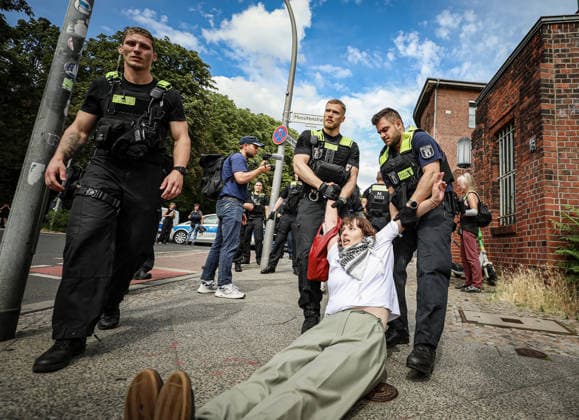 July 10, 2026, Berlin, Berlin, Germany: BERLIN, GERMANY - JULY 10, 2026: Police officers forcibly remove and detain pro-Palestinian activists during a protest outside a Rheinmetall facility in BerlinÃ¢â‚¬â ¢s Wedding district. Demonstrators were protesting German arms production, weapons exports and military support for Israel. Berlin Germany  - ZUMAa268 20260710_zip_a268_018 Copyright: xAbdelrahmanxAlkahloutx