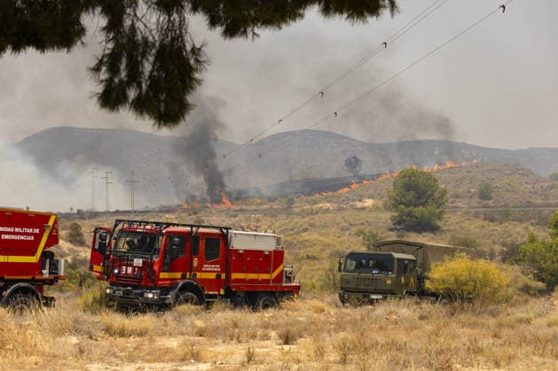 Forest fire kills at least 12 in southern Spain ALMERIA, SPAIN - JULY 10: Flames smoke rise from the forest fire while evacuation and firefighting efforts continue in the Los Gallardos district of Almeria, Spain on July 10, 2026. At least 12 people were killed in a forest fire that broke out Thursday in Los Gallardos municipality in Almeria province in Spain’s southern Andalusia region, broadcaster RTVE reported. According to Andalusia’s emergency services, the victims were found in a hamlet of the neighboring municipality of Bedar, with some discovered inside vehicles engulfed by the flames. Chema Artero Anadolu Almeria Spain. Editorial use only. Please get in touch for any other usage.  Copyright: x2026xAnadoluxChemaxArterox