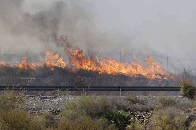 Forest fire kills at least 12 in southern Spain ALMERIA, SPAIN - JULY 10: Intense flames rage along a roadside guardrail during a massive wildfire while evacuation and firefighting efforts continue in the Los Gallardos district of Almeria, Spain on July 10, 2026. At least 12 people were killed in a forest fire that broke out Thursday in Los Gallardos municipality in Almeria province in Spain’s southern Andalusia region, broadcaster RTVE reported. According to Andalusia’s emergency services, the victims were found in a hamlet of the neighboring municipality of Bedar, with some discovered inside vehicles engulfed by the flames. Pablo Miranzo Anadolu Almeria Spain. Editorial use only. Please get in touch for any other usage.  Copyright: x2026xAnadoluxPabloxMiranzox