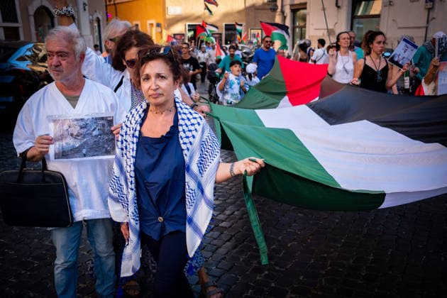 July 10, 2026, Rome, Rm, Italy: Activists from the group Health Workers for Gaza are holding a rally in front of Montecitorio, the Chamber of Deputies, to demand the release of Dr. Hussam Abu Safiya and all other Palestinian prisoners. Participants arrive in front of Montecitorio. Rome Italy  - ZUMAg256 20260710_znp_g256_018 Copyright: xMarcoxDixGianvitox