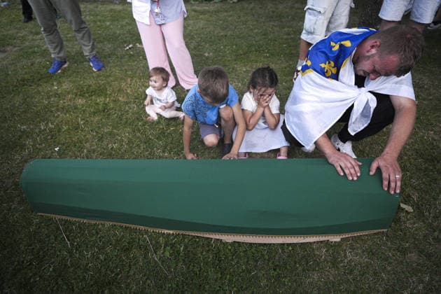 Coffins brought to Musalla in Potocari: The last farewell to the victims of the genocide in Srebrenica SREBRENICA, BOSNIA AND HERZEGOVINA - JULY 10: Family members of the victims and Peace March participants carry coffins containing the remains of ten Srebrenica genocide victims from the former Battery Factory to the Musalla area at the Potocari Memorial Center Cemetery in Srebrenica, Bosnia and Herzegovina, on July 10, 2026. Relatives and participants gathered with prayers and tears ahead of tomorrow s collective funeral and burial on the 31st anniversary of the 1995 genocide. Samir Jordamovic Anadolu Srebrenica Bosnia and Herzegovina. Editorial use only. Please get in touch for any other usage.  Copyright: x2026xAnadoluxSamirxJordamovicx