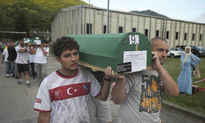 Coffins brought to Musalla in Potocari: The last farewell to the victims of the genocide in Srebrenica SREBRENICA, BOSNIA AND HERZEGOVINA - JULY 10: Family members of the victims and Peace March participants carry coffins containing the remains of ten Srebrenica genocide victims from the former Battery Factory to the Musalla area at the Potocari Memorial Center Cemetery in Srebrenica, Bosnia and Herzegovina, on July 10, 2026. Relatives and participants gathered with prayers and tears ahead of tomorrow s collective funeral and burial on the 31st anniversary of the 1995 genocide. Samir Jordamovic Anadolu Srebrenica Bosnia and Herzegovina. Editorial use only. Please get in touch for any other usage.  Copyright: x2026xAnadoluxSamirxJordamovicx