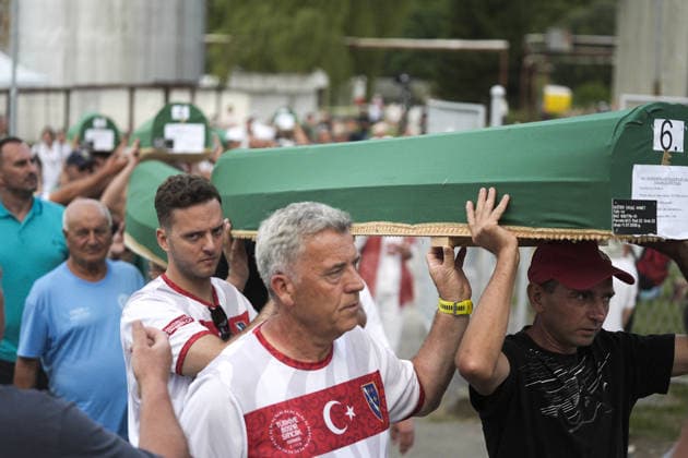 Coffins brought to Musalla in Potocari: The last farewell to the victims of the genocide in Srebrenica SREBRENICA, BOSNIA AND HERZEGOVINA - JULY 10: Family members of the victims and Peace March participants carry coffins containing the remains of ten Srebrenica genocide victims from the former Battery Factory to the Musalla area at the Potocari Memorial Center Cemetery in Srebrenica, Bosnia and Herzegovina, on July 10, 2026. Relatives and participants gathered with prayers and tears ahead of tomorrow s collective funeral and burial on the 31st anniversary of the 1995 genocide. Samir Jordamovic Anadolu Srebrenica Bosnia and Herzegovina. Editorial use only. Please get in touch for any other usage.  Copyright: x2026xAnadoluxSamirxJordamovicx
