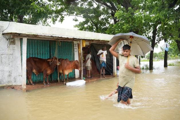 July 10, 2026, Banshkhali, Bangladesh: BANSHKHALI, CHATTOGRAM, BANGLADESH Ã¢â‚¬ JULY 10, 2026: Residents wade through floodwaters and evacuate children and belongings after days of heavy monsoon rainfall, runoff from surrounding hills and high tides caused severe flooding in Banshkhali Upazila, Chattogram. Hundreds of homes, roads and agricultural land have been inundated, leaving many families stranded and increasing concerns over access to shelter, clean water and essential services. Authorities and local volunteers continue to monitor the situation as affected residents wait for floodwaters to recede. Photos by JNA PRESS. Banshkhali Bangladesh  - ZUMAq101 20260710_zna_q101_095 Copyright: xIstiyakxAhamedxSrabonx