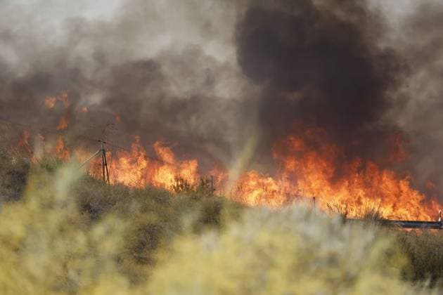 July 10, 2026, Almeria, ES: ALMERIA, SPAIN - JULY 10: Large walls of fire and dense smoke tear through dry vegetation during a massive wildfire in Los Gallardos, Almeria province, southern Spain, on July 10, 2026. This disaster represents the most severe fire event in the history of Andalusia, resulting in twelve confirmed fatalities, twenty-three individuals missing, and the urgent evacuation of six hundred citizens, with emergency relief teams coordinating temporary housing from the nearby town of Garrucha. Stinger Jna press Almeria ES  - ZUMAq101 20260710_zna_q101_107 Copyright: xEditorx
