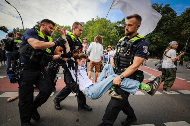 July 10, 2026, Berlin, Germany: German Police officers forcibly remove and detain pro-Palestinian activists during a protest outside a Rheinmetall facility in Berlin s Wedding district. Demonstrators were protesting German arms production, weapons exports and military support for Israel. Berlin Germany - ZUMAa268 20260710_zip_a268_017 Copyright: xAbdelrahmanxAlkahloutx