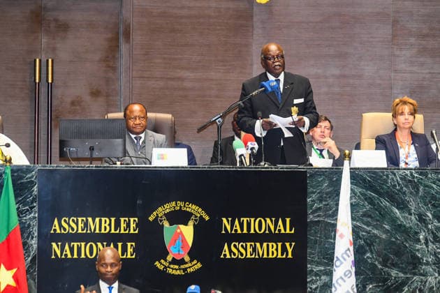 (260710) -- YAOUNDE, July 10, 2026 -- Photo taken on July 10, 2026 shows Hilarion Etong (standing), President of the Parliamentary Assembly of La Francophonie, delivering a speech at the 51st plenary session of the assembly in Yaounde, Cameroon. Parliamentarians from across the French-speaking world gathered in Cameroon Friday for the 51st plenary session of the Parliamentary Assembly of La Francophonie, or APF. ) CAMEROON-YAOUNDE-APF Kepseu 
